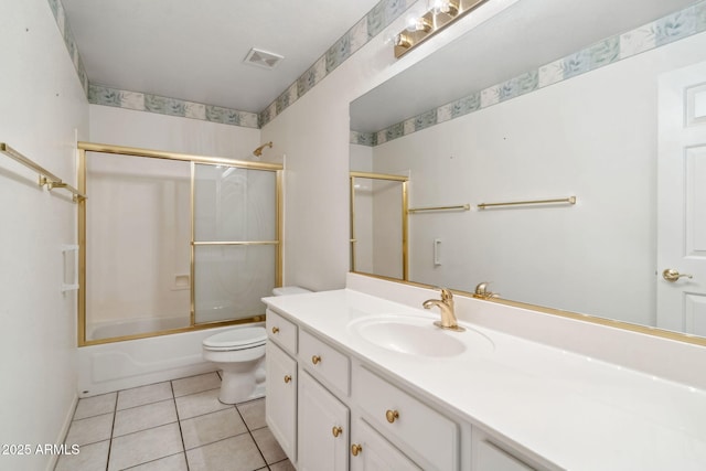 8426 W Utopia Rd, Peoria, AZ 85382 - bathroom featuring toilet, vanity, enclosed tub / shower combo, and tile patterned floors