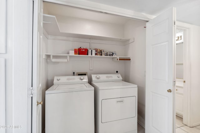 8426 W Utopia Rd, Peoria, AZ 85382 - washroom featuring separate washer and dryer and light tile patterned floors