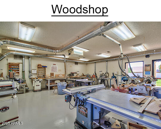 8426 W Utopia Rd, Peoria, AZ 85382 - garage with a workshop area