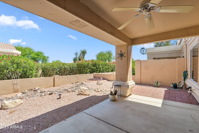 8426 W Utopia Rd, Peoria, AZ 85382 - fenced backyard featuring ceiling fan and a patio