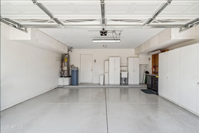 8426 W Utopia Rd, Peoria, AZ 85382 - garage with gas water heater, a garage door opener, and a sink