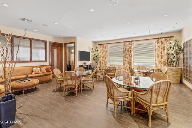 dining area with light hardwood / wood-style flooring