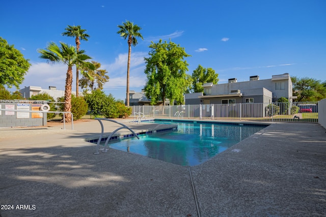 view of swimming pool featuring a patio