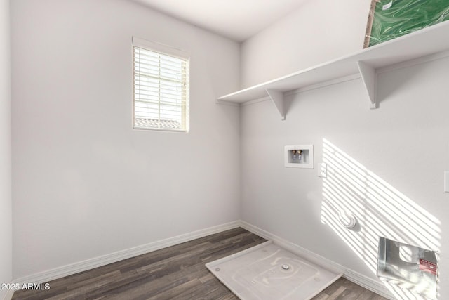 laundry area featuring laundry area, hookup for a washing machine, baseboards, and wood finished floors