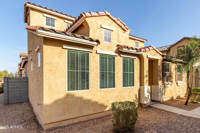 exterior space with stucco siding