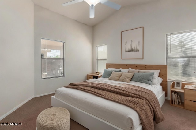 bedroom featuring a ceiling fan, baseboards, light colored carpet, and high vaulted ceiling