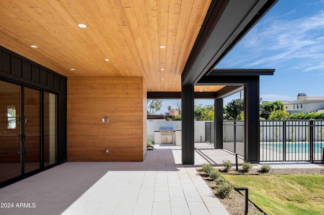 view of patio / terrace featuring a fenced in pool