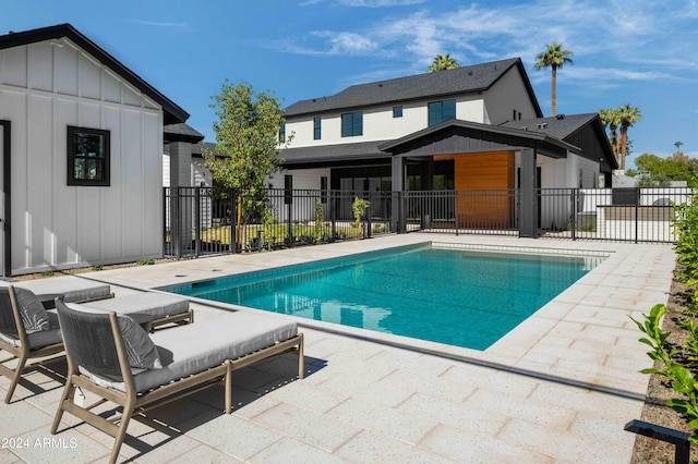 view of pool featuring a patio area