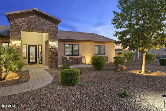 view of front facade featuring a patio area