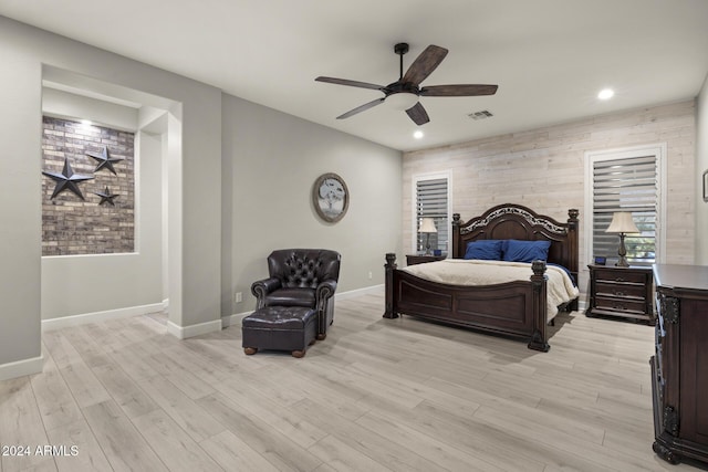 bedroom featuring light hardwood / wood-style floors and ceiling fan