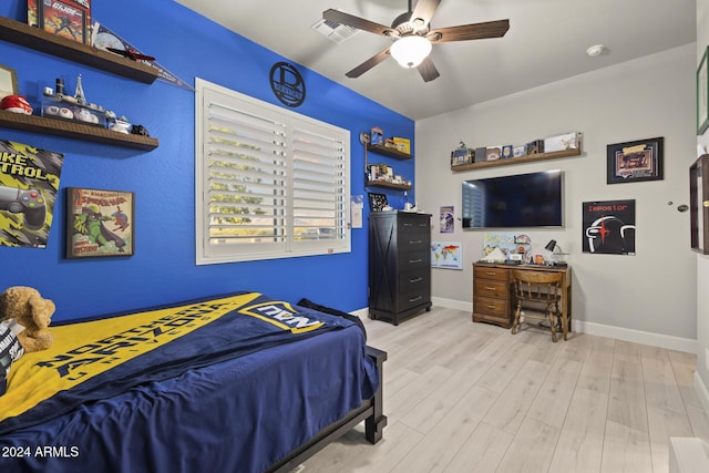 bedroom featuring ceiling fan and light hardwood / wood-style flooring