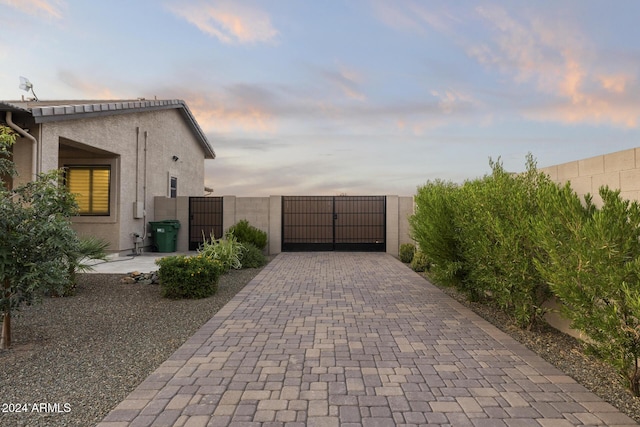 view of property exterior at dusk