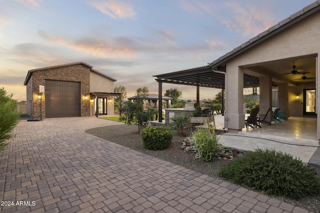 patio terrace at dusk with a garage