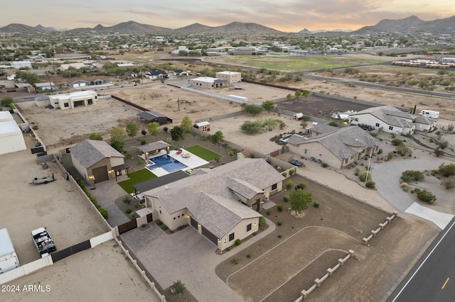 aerial view at dusk with a mountain view