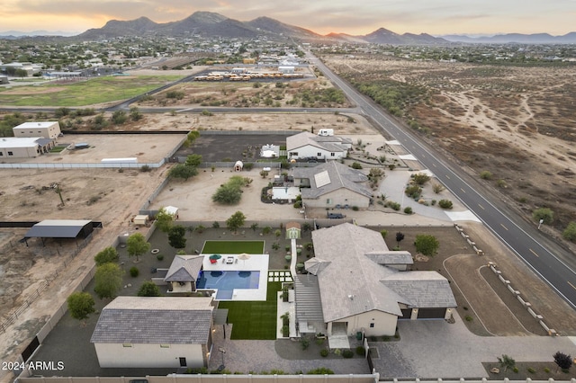 aerial view at dusk with a mountain view