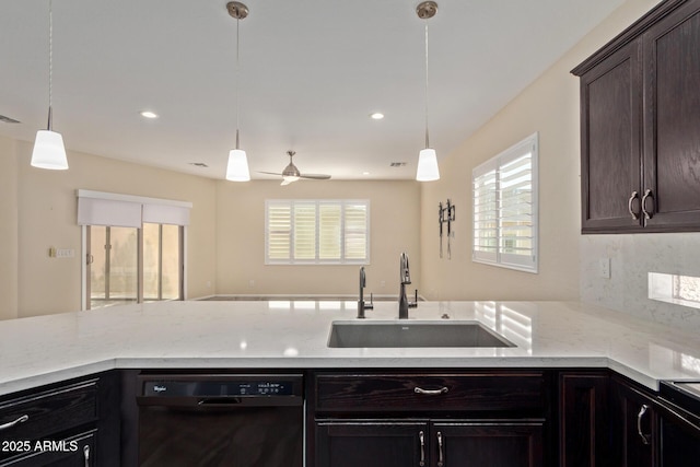 kitchen with sink, dark brown cabinets, black dishwasher, decorative backsplash, and decorative light fixtures