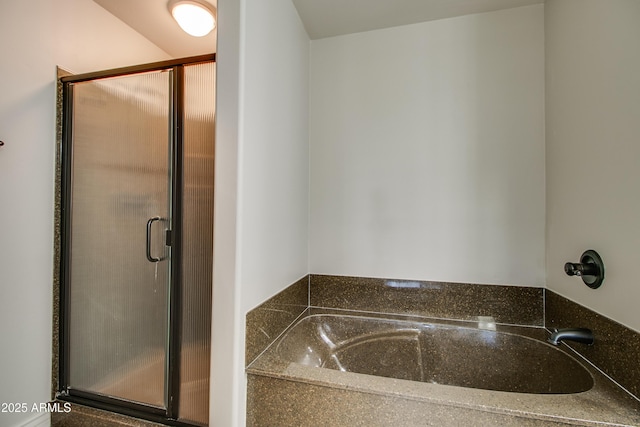 bathroom with an enclosed shower