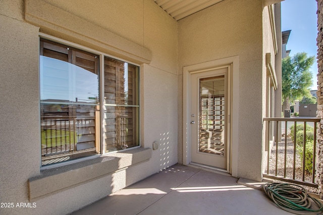 doorway to property with a balcony