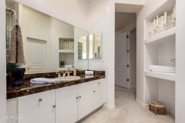 8324 E Cactus Wren Rd, Scottsdale, AZ 85250 - bathroom with vanity and baseboards