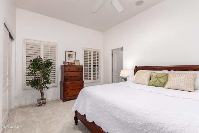 8324 E Cactus Wren Rd, Scottsdale, AZ 85250 - bedroom with light carpet and a ceiling fan