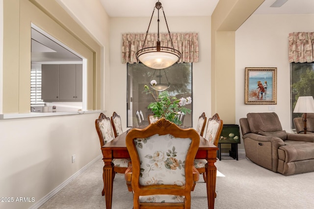 8324 E Cactus Wren Rd, Scottsdale, AZ 85250 - dining area featuring carpet floors and baseboards