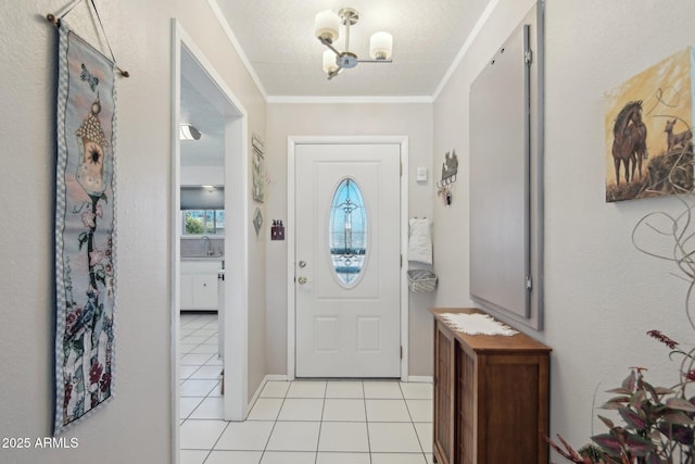 entryway with crown molding and light tile patterned floors