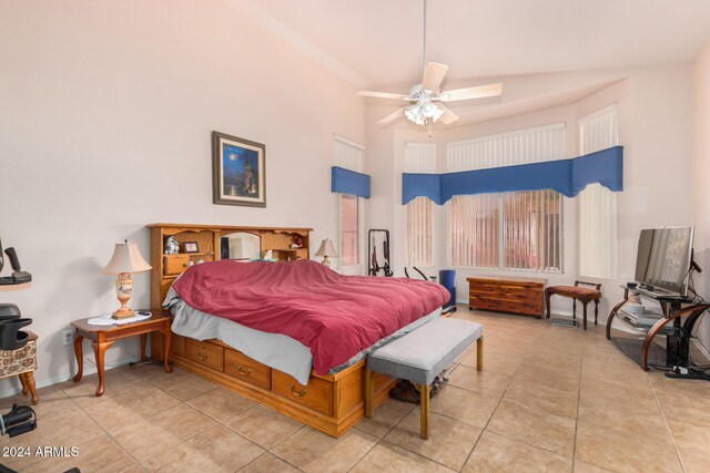 tiled bedroom with ceiling fan