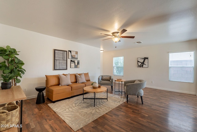 4642 E Sierrita Rd, San Tan Valley, AZ 85143 - living room featuring wood finished floors, a ceiling fan, and baseboards