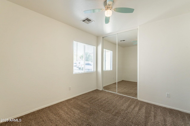 4642 E Sierrita Rd, San Tan Valley, AZ 85143 - unfurnished bedroom featuring carpet, a closet, ceiling fan, and baseboards