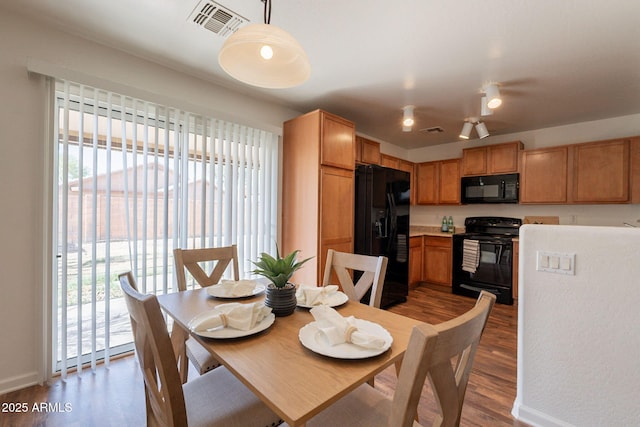 4642 E Sierrita Rd, San Tan Valley, AZ 85143 - dining space featuring wood finished floors, healthy amount of natural light, and baseboards