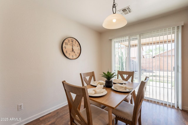 4642 E Sierrita Rd, San Tan Valley, AZ 85143 - dining room featuring baseboards and dark wood finished floors