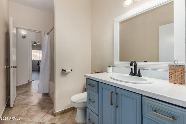 full bathroom featuring vanity, toilet, shower / tub combo, and tile patterned flooring