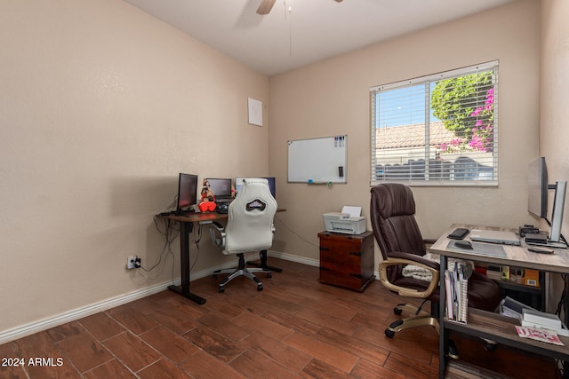 office with ceiling fan and dark hardwood / wood-style flooring