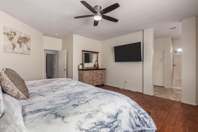 bedroom with ceiling fan and dark hardwood / wood-style flooring