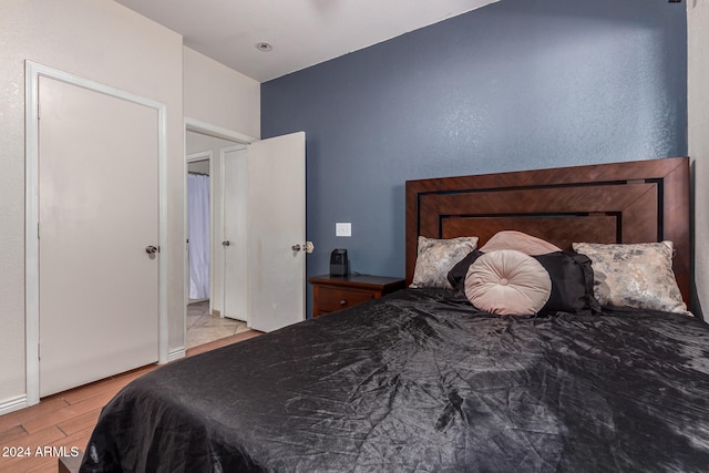 bedroom featuring light hardwood / wood-style floors