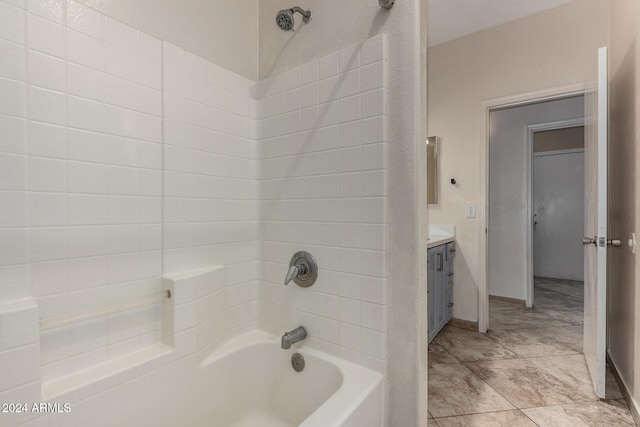 bathroom featuring vanity and shower / tub combination