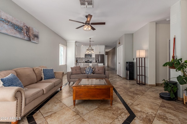 living room featuring ceiling fan