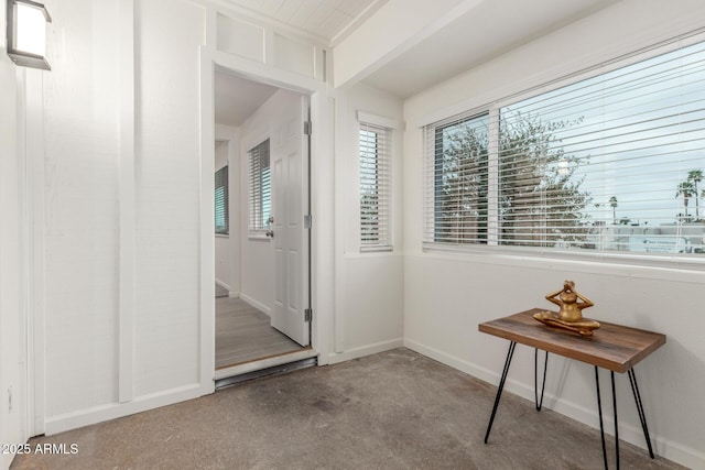 2608 W Berridge Ln Unit 220, Phoenix, AZ 85017 - interior space featuring carpet floors, baseboards, and beam ceiling