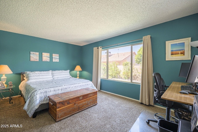 bedroom featuring carpet, a textured ceiling, and baseboards