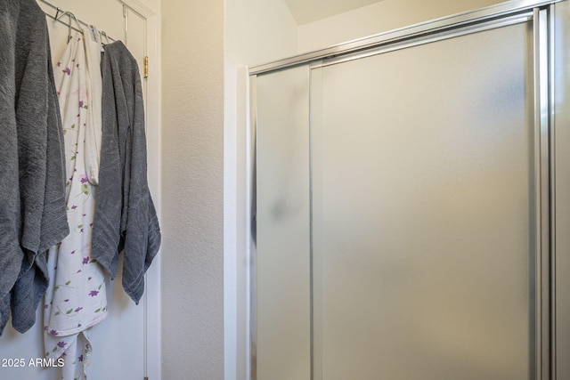 bathroom with a stall shower