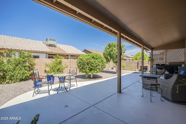 view of patio featuring central air condition unit and a fenced backyard