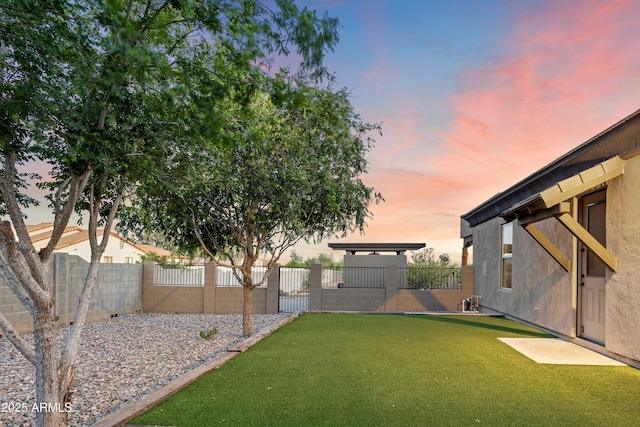 view of yard featuring a fenced backyard