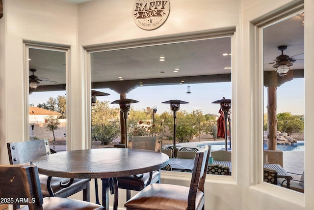 dining room featuring ceiling fan