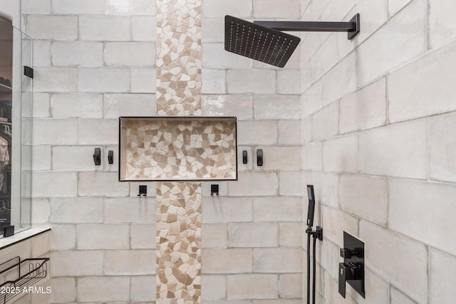 details featuring a tile shower