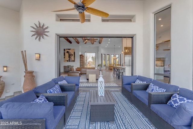 view of patio featuring outdoor lounge area and ceiling fan