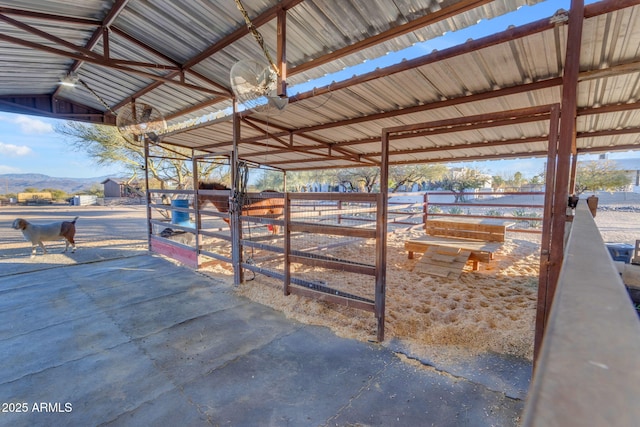 view of stable with a mountain view