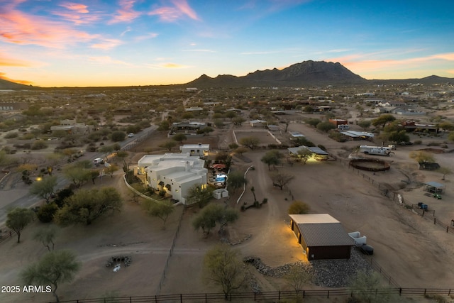 aerial view at dusk with a mountain view