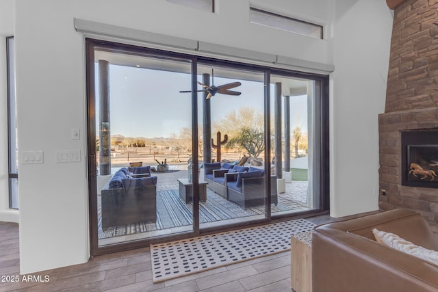 doorway featuring plenty of natural light and ceiling fan