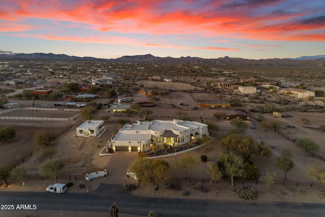 aerial view at dusk with a mountain view