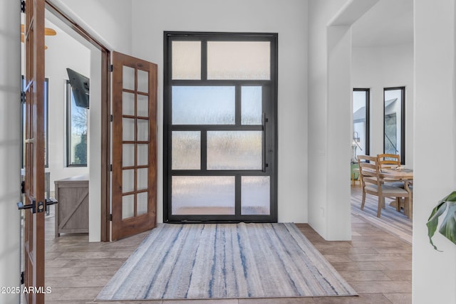 entrance foyer with light hardwood / wood-style flooring